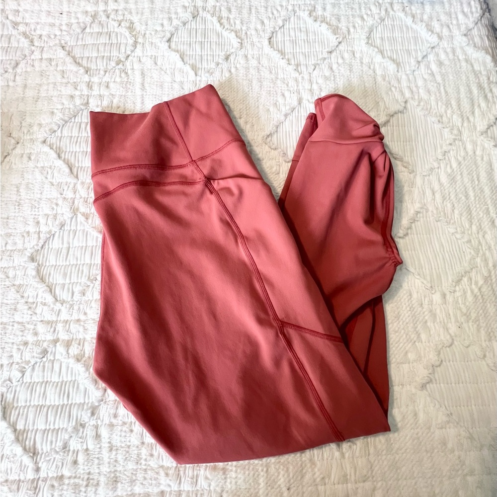 Salmon colored medium fabletic leggings